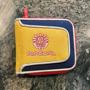 Y2K era Rip Curl Yellow, Red, and Navy Wallet with three sided zipper